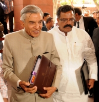 Arriving at Parliament House to present the Rail Budget 2013-14, in New Delhi on February 26, 2013.