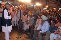 Addressing public meeting at Village Burail