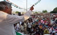 Addressing gathering at sector 52 during public meeting in Chandigarh.